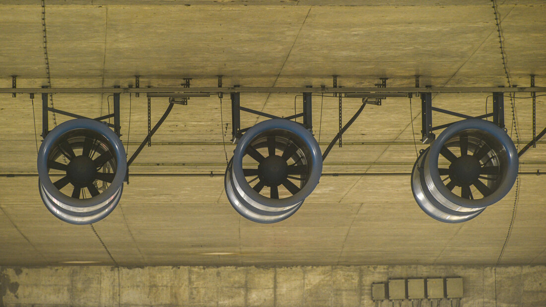 Ceiling-mounted fans in a road tunnel