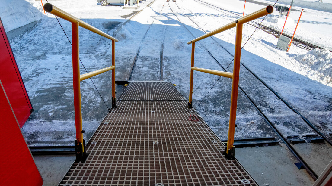 View of the downward leading rear ramp of the fire and rescue vehicle