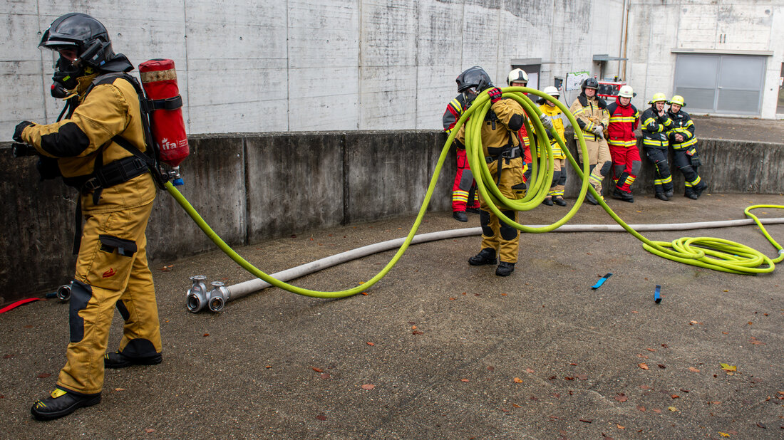 Hose pack carried over the shoulder.