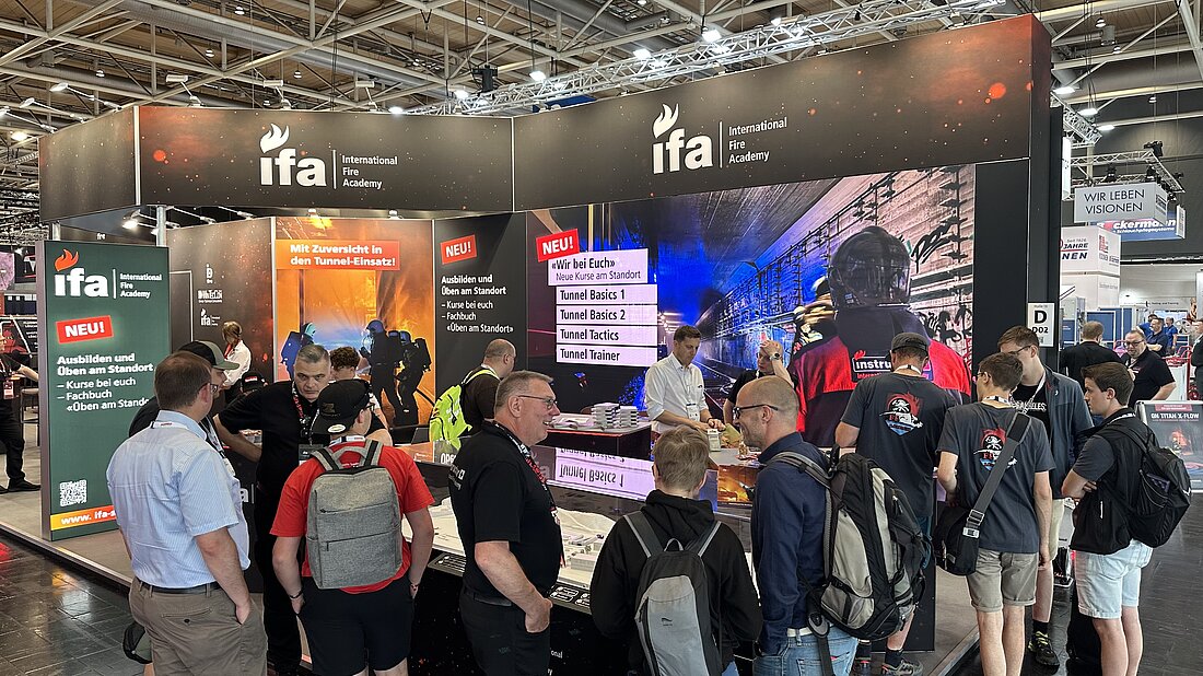 Interschutz-Messestand Besucher am Messestand der International Fire Academy während der Interschutz 2026