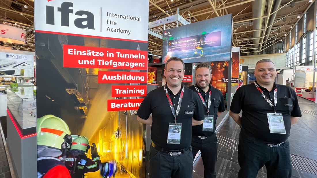 Ready to answer visitors' questions: instructors Thomas Luder, Marcel Schleuniger and Sandro Stramonio (from left to right) from the International Fire Academy.
