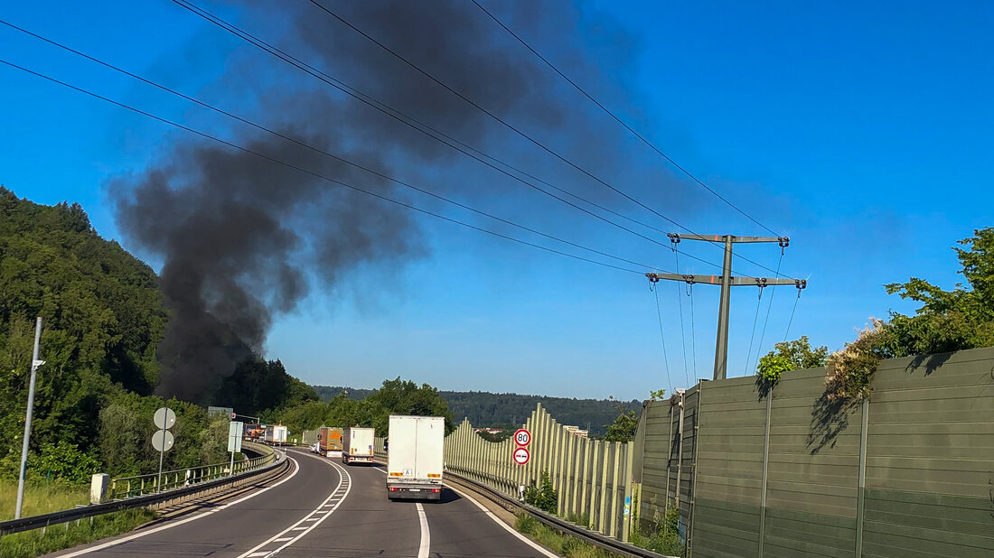 Smoke escaping from a portal of the Bürgerwald Tunnel.